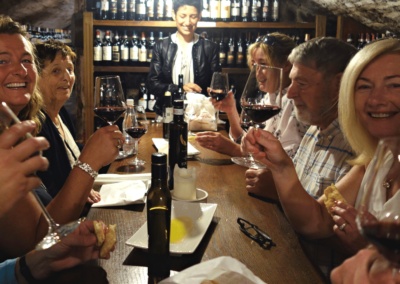 2Italia Food & Wine. Ancient Wine cellar in Lucca. Wine tasting.